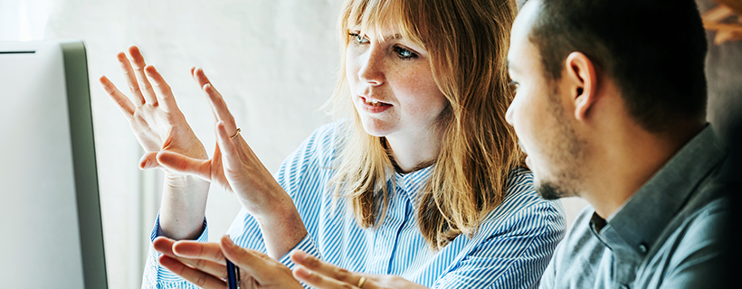 HR professionals working in front of computer