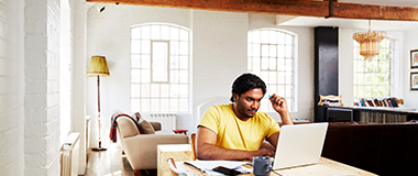 A man working from home at his desk