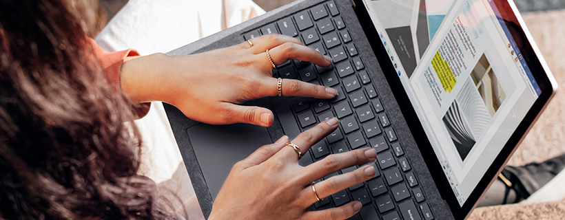 women-typing-on-tablet-keyboard